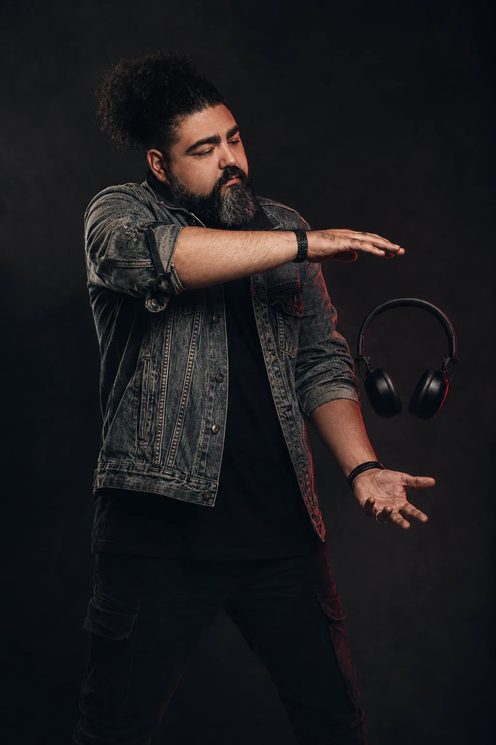 Symeon Shawn listening in the studio
