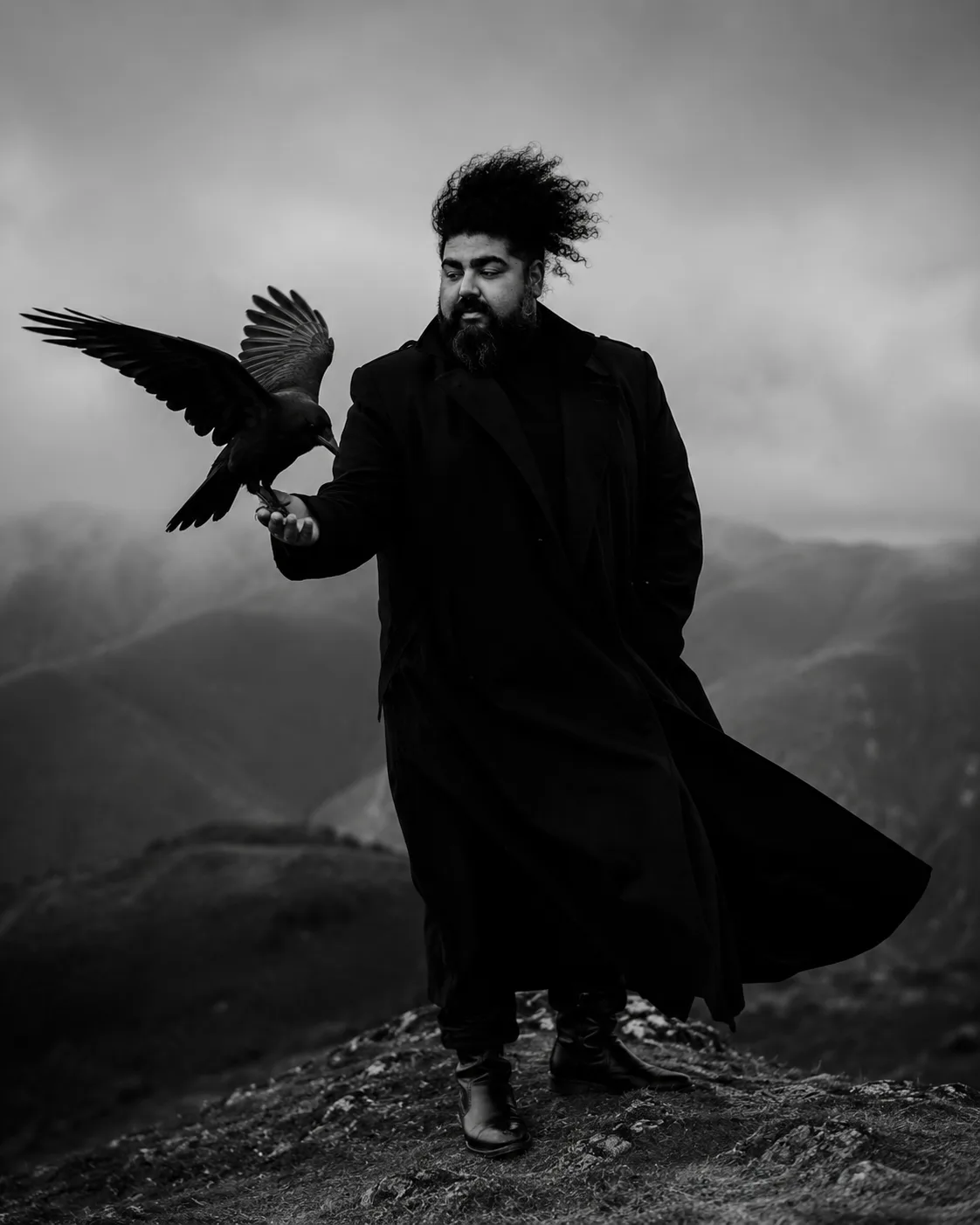 Cinematic portrait of Symeon Shawn with a raven